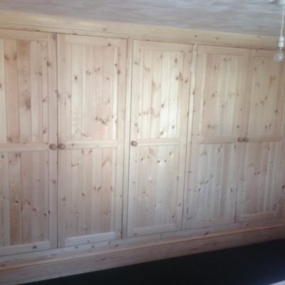 Natural pine tongue and groove panel doors