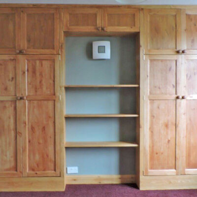Pine shaker style built-in cupboard with open shelving