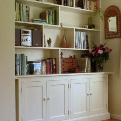 Flat Panel white alcove cupboard with open shelving for books