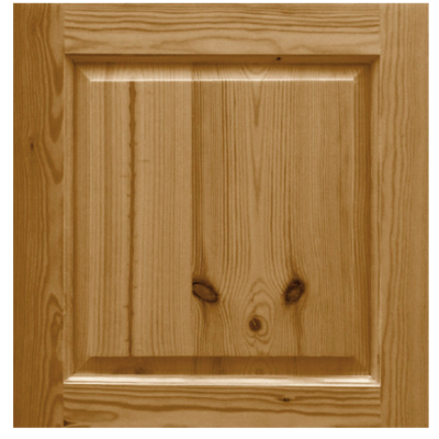 Close-up of a raised and fielded pine cupboard door